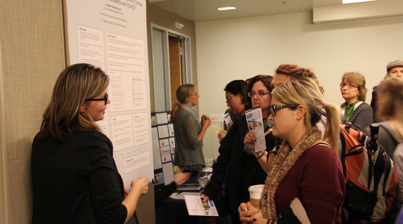 Group of students with a one student presenting 