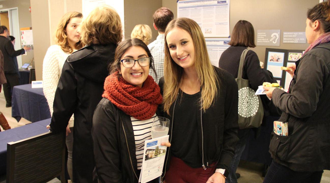 Two students posing 