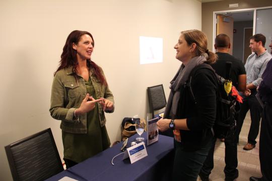 Two grad students having a conversation 