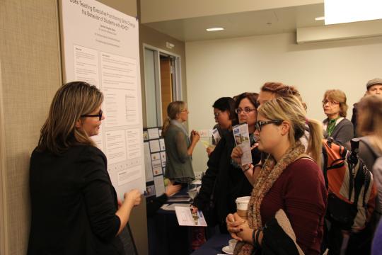 Group of students with a one student presenting 